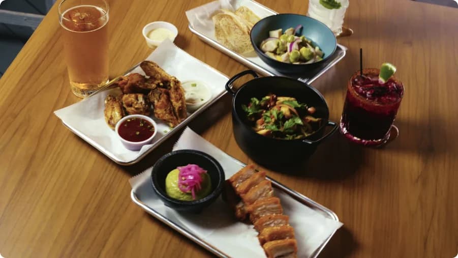 Swing Tropical restaurant video with plates and drinks on a table